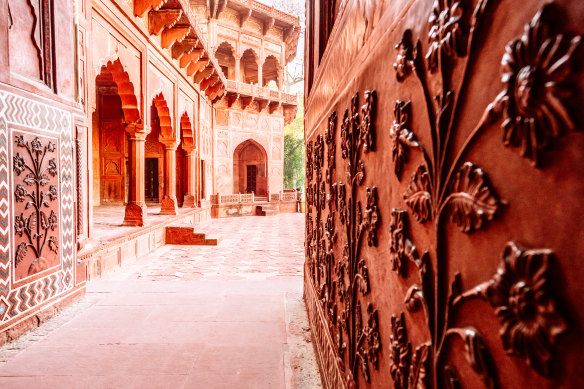 Get up close to inspect the carved flowers and geometric banding.