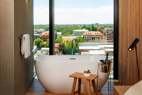 Guests staying on the Vibe’s upper levels can look out to the Adelaide Hills or cityscape from their bath.