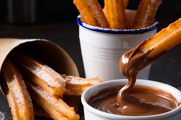 Avoid those late nights at Spanish eateries by filling up on churros and coffee during the day.