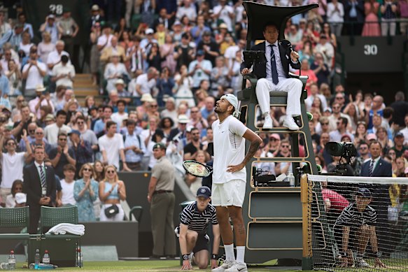 Nick Kyrgios takes a moment to reflect after winning through to the Wimbledon semi-final.