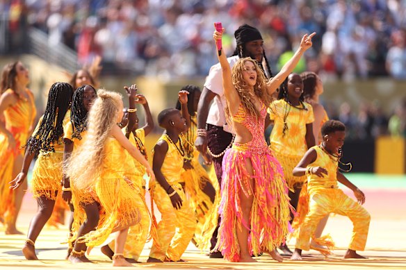 Shakira dances on stage.
