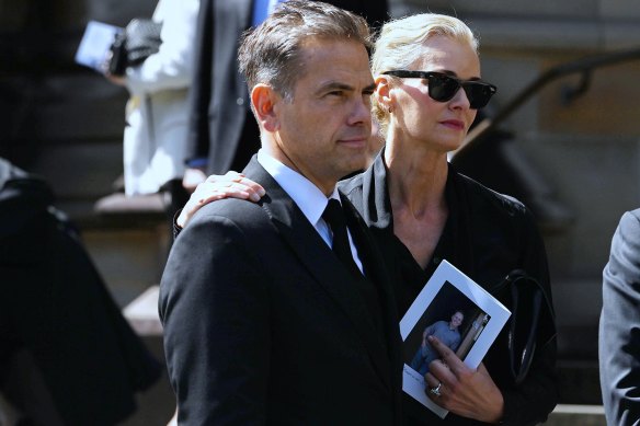 Lachlan and Sarah Murdoch at the funeral of Brian Walsh in Sydney this week.