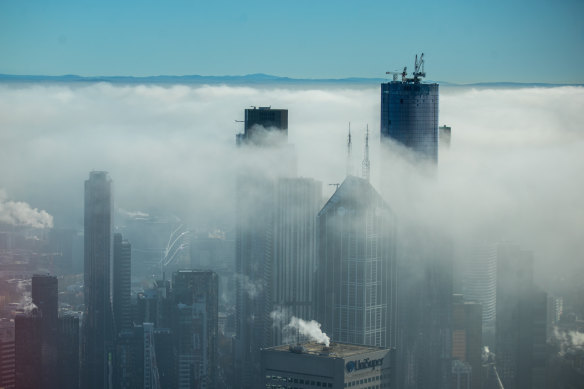 Melbourne’s Eureka Tower poking through the clouds. 