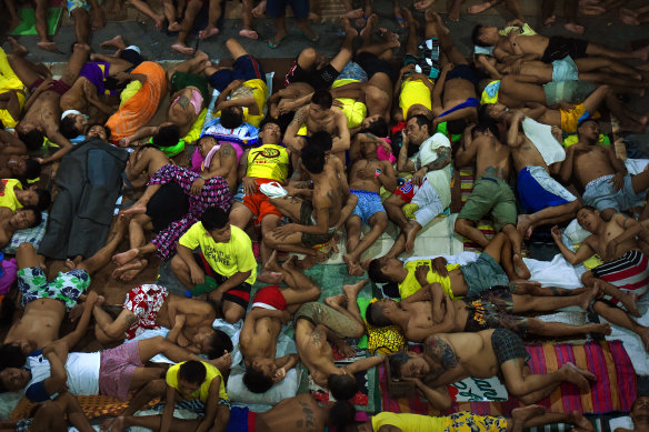 Some of the 3562 Inmates, incarcerated as part of the Philippines drug war, sleep in Quezon City Jail, Manila, in 2016.