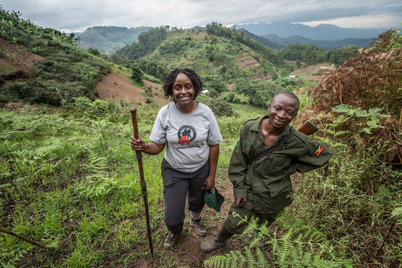 Dr. Gladys Kalema-Zikusoka and a ranger track gorillas in Bwindi Impenetrable National Park.