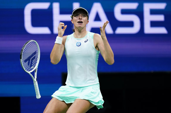 World No.1 Iga Swiatek reacts after winning her US Open semi-final.