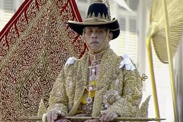 Thai King Maha Vajiralongkorn is carried on a palanquin outside the Grand Palace in Bangkok for the public to pay homage to him on the second day of his coronation ceremony last year.
