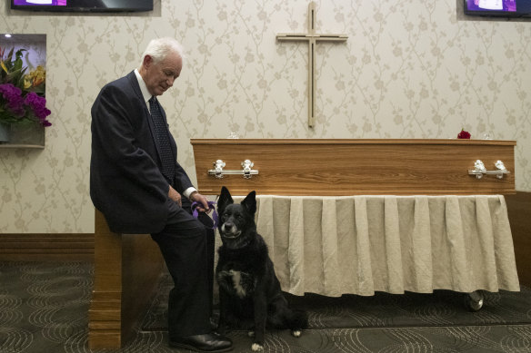 Son-in-law Bob Mitchell and Cindy the dog at Jacob Elias' funeral. "She was there for (Jacob) living alone, she was there for him on the last day and there for him when we celebrated his life," Mr Mitchell said.
