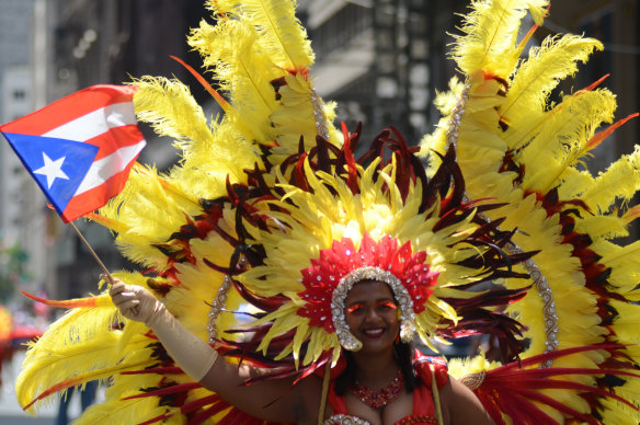 Marcher at the Puerto Rican  Day Parade on Sixth Avenue.