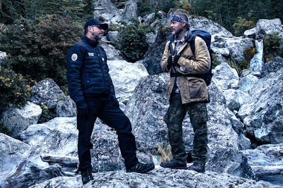 Director David Ayer (left) with Pitt on location in New Zealand’s South Island.