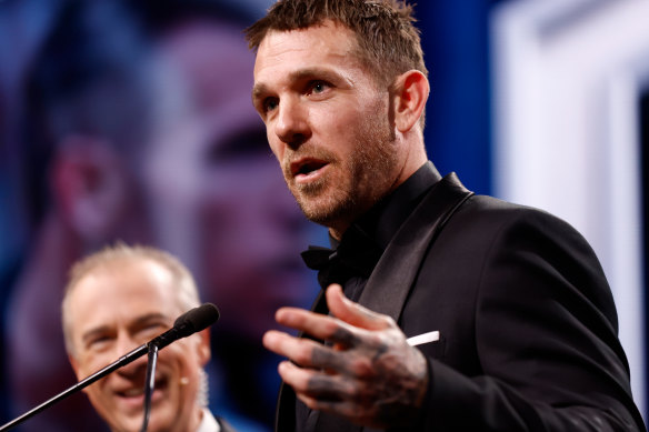 Dane Swan addresses the room.