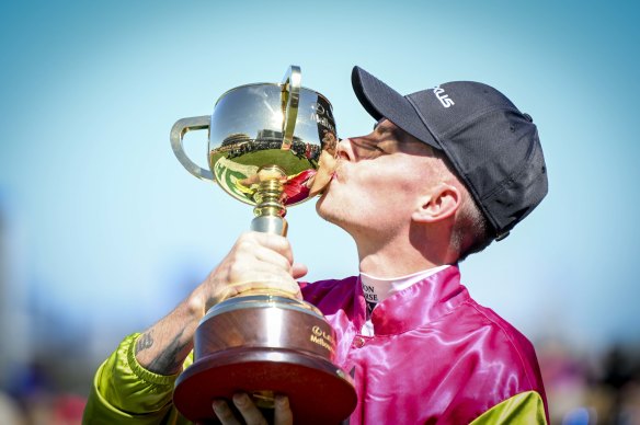 Robbie Dolan celebrates his Melbourne Cup-winning ride on Knight’s Choice.
