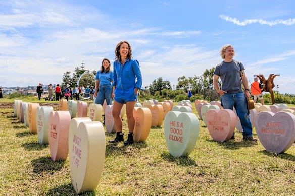 Omi McCurdie, Pip Lysaght and Matty McCarron, with their sculpture Sweethearts.