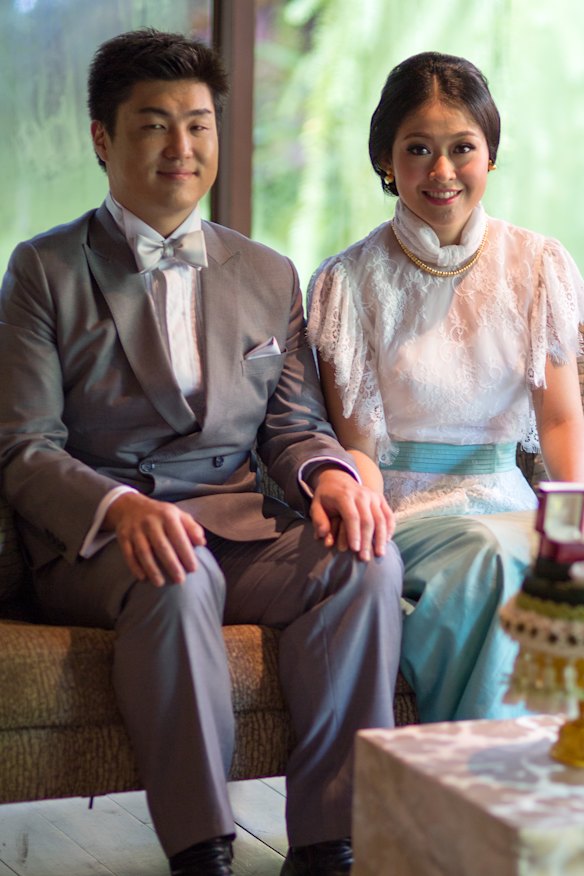 The couple at their wedding ceremony in Bangkok, 2014.
