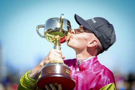 Robbie Dolan celebrates his Melbourne Cup winning ride on Knight’s Choice.