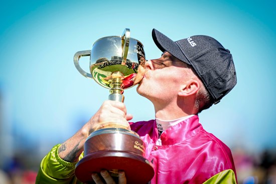 Robbie Dolan celebrates his Melbourne Cup winning ride on Knight’s Choice.