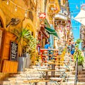 Summer and a cafe in Valletta’s old town in Malta.
