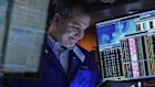 Trader Christopher Lagana works on the floor of the New York Stock Exchange, Friday, April 11, 2025. (AP Photo/Richard Drew)
