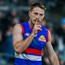 Will Lewis quiets the crowd after marking on the final siren in Adelaide.