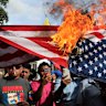 Supporters of ousted Venezuelan President Nicolás Maduro burn a US flag in Caracas.