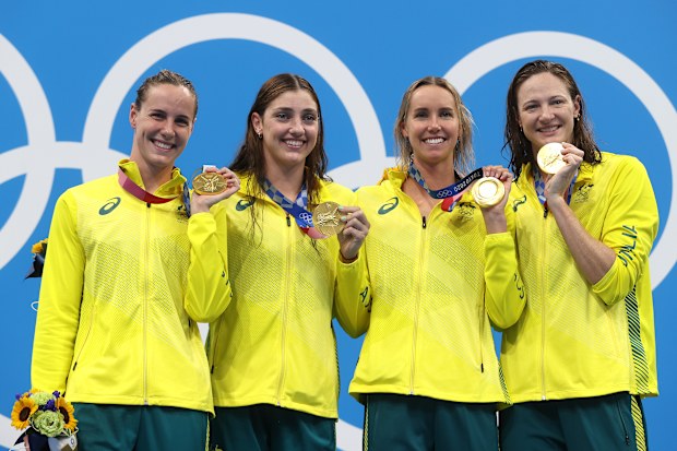 From left: Bronte Campbell, Meg Harris, Emma McKeon and Cate Campbell pictured after winning gold in the women's 4x100m freestyle relay at the Tokyo 2021 Olympics.