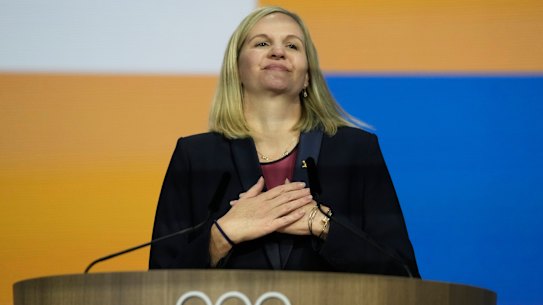 Kirsty Coventry reacts after she was announced as the new International Olympic Committee president.