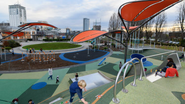 Children enjoy at a playground in Christchurch, New Zealand where the country maintains Level 2 restrictions.
