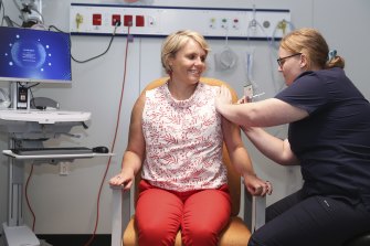 Labor MP Peta Murphy received her first COVID-19 vaccination from registered nurse Michelle Keaveney on Tuesday morning.