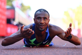 Sisay Lemma of Ethiopia celebrates winning the Men’s Elite race during the 2021 London Marathon at Tower Bridge, London, on Sunday.