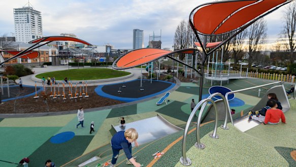 Children at a playground in Christchurch, New Zealand, where the country maintains Level 2 restrictions.