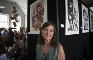 Kaye Duffy bought the painting Winged Lovers, left, by Mirka Mora and John Perceval. 