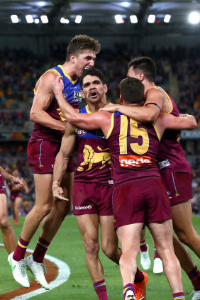 The Lions celebrate in their game against the West Coast Eagles.