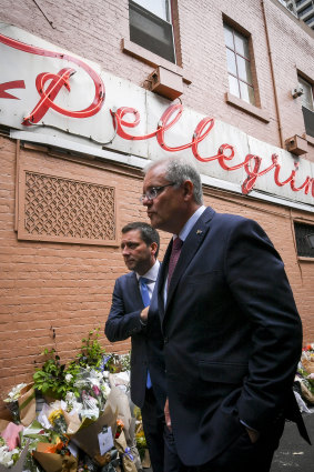 Prime Minister Scott Morrison and Victorian opposition leader Matthew Guy at Pellegrini's cafe after this month's Bourke Street attack, in which the cafe's co-owner Sisto Malaspina was killed.