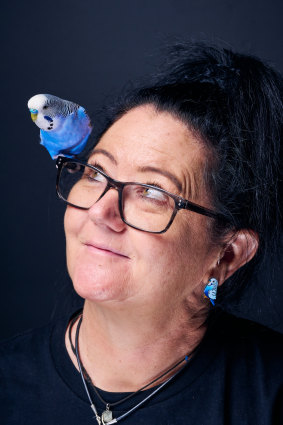 Cassie Leatham and her budgie Mr Beaky