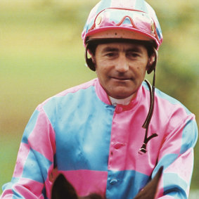 Harry White’s standing as a jockey was reflected in his induction into the racing hall of fame. Pictured here in 1993, he had just won a 2000-metre race at Caulfield.