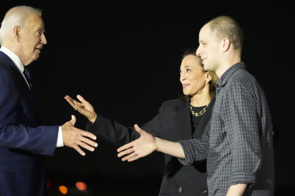 President Joe Biden and Vice President Kamala Harris greet reporter Evan Gershkovich at Andrews Air Force Base after he was freed in a prisoner swap.