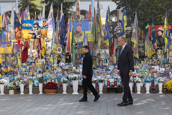 Zelensky and Merz at a memorial for fallen Ukrainian soldiers in Kyiv.