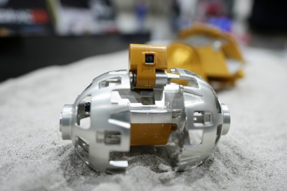 A palm-sized model of the Lunar Exploration Vehicle 2 (LEV-2).