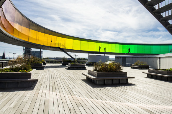ARoS art gallery is topped by a coloured glass ring with 360-degree rainbow views over the city.