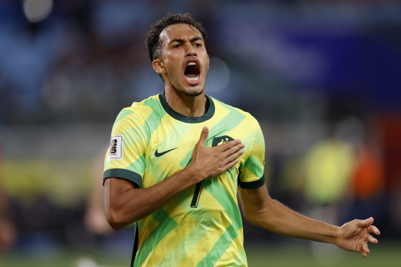 Nishan Velupillay celebrates a goal for Australia.