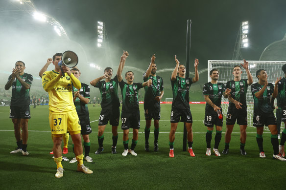 Top of the table: Western United celebrate with fans.