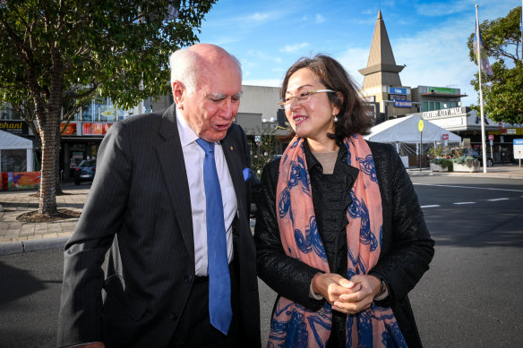 Chisholm MP Gladys Liu campaigns with former prime minister John Howard in Glen Waverley on Tuesday.