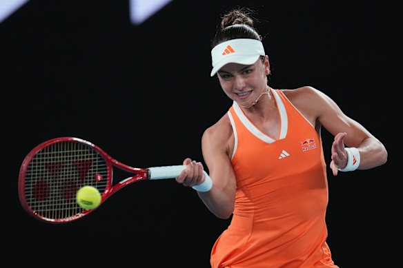 Iva Jovic of the US plays a forehand return to Priscilla Hon of Australia.