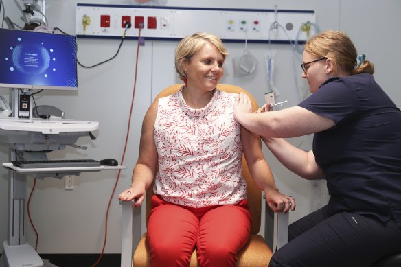 Labor MP Peta Murphy received her first COVID-19 vaccination from registered nurse Michelle Keaveney on Tuesday morning.