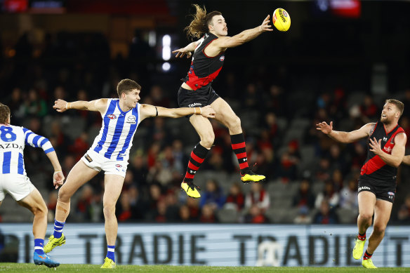 Sam Draper of the Bombers and North’s Callum Coleman-Jones go head-to-head.