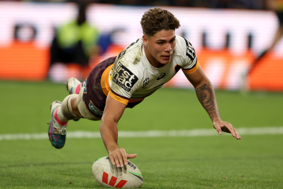 Reece Walsh of the Broncos scores a try, which was later disallowed by the video bunker.