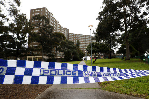 Residents in Carlton's public housing have tested positive, but a lockdown like in North Melbourne (pictured) is not on the cards.