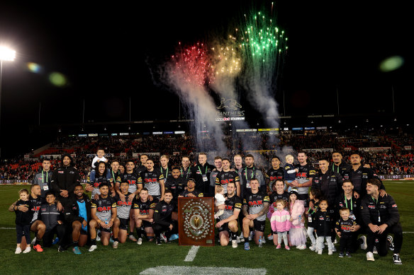 Panthers players and their families with the  JJ Giltinan Shield.