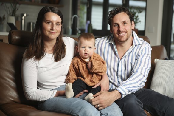 Brooke Bennett, pictured with her husband Tim and their son Banjo, says the ACT lockdown has made her dwell on the difficult things about being a new parent. 