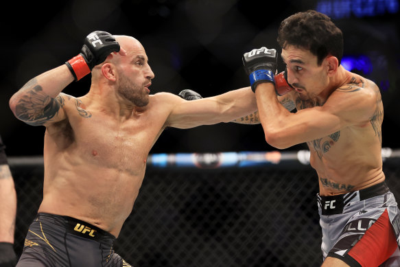 Alexander Volkanovski (left) throws a punch at Max Holloway during UFC 276 in Las Vegas, Nevada, in 2022.